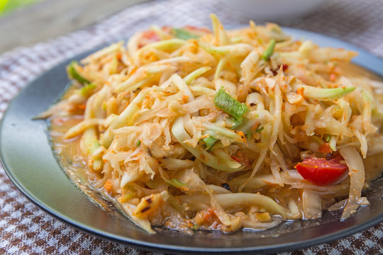 Closeup Thai papaya salad serve with vegetables, popular thai