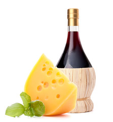 Red wine bottle and  cheese still life