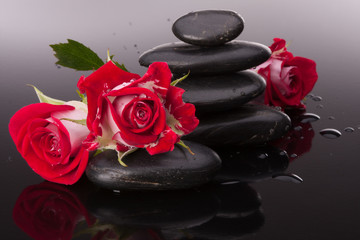 Spa stone and rose flowers still life. Healthcare concept.