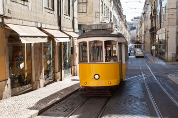 Naklejka premium Traditional Tram Moving On Street
