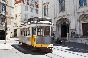 Fototapeta na wymiar Classic Tram Moving On Street