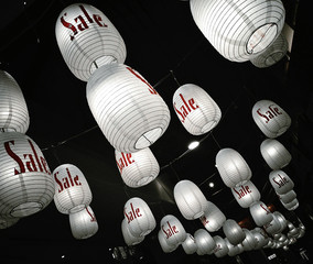 Japanese lanterns printed the word "SALE"