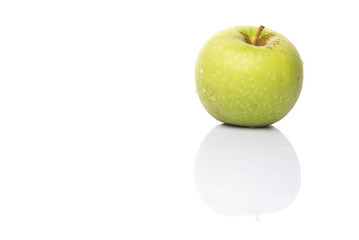 Green apple over white background