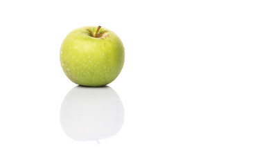 Green apple over white background