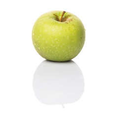 Green apple over white background