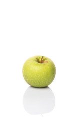 Green apple over white background