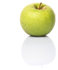 Green apple over white background