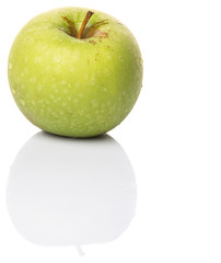 Green apple over white background