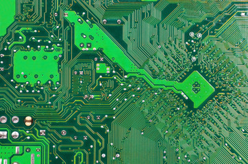 Close up of a printed green computer circuit board