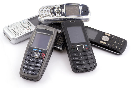 Bunch of old mobile phones isolated