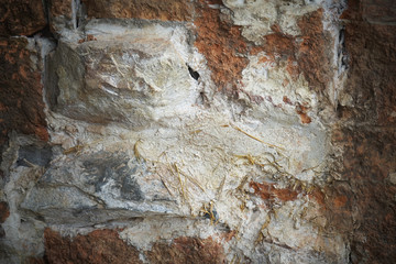 grunge white and brown stone wall with vignette