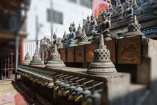 Buddhist statue in Gangaramaya Temle.