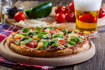 Pizza hawaii with beer