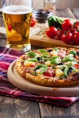 Pizza hawaii with beer