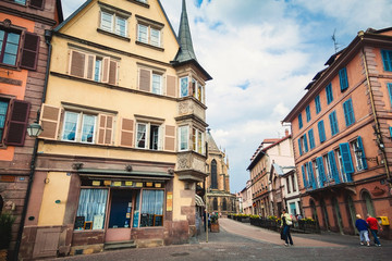Fototapeta na wymiar Panoramic view on old street with half timbered houses in Colmar