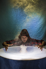 The man in a smoke above a mask 