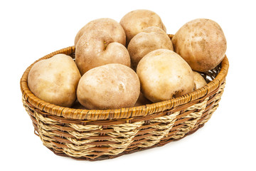 Fresh potatoes in a basket isolated on white