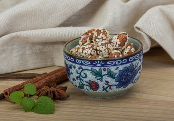 Peanut in honey with sesame seeds