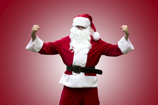Santa Claus flexing his muscles
