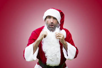 surprised Santa Claus isolated