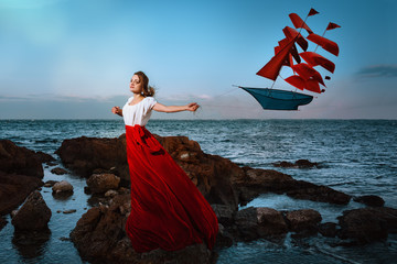 Beautiful girl holding a kite