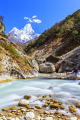 Fototapeta na wymiar Snow covered mountains and rocky peaks in Himalaya