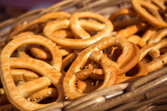 salted pretzels in a basket at the farmer market