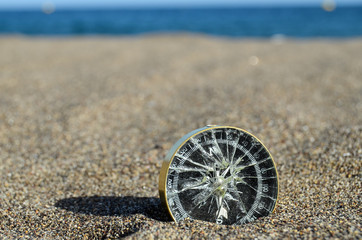 Tourist Compass in the Sand