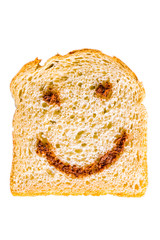a slice of bread with nutella smile