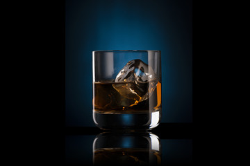 Whiskey in Glass with Ice Cubes