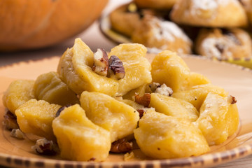 homemade pumpkin gnocchi with pecan nuts