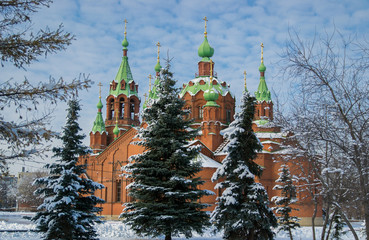 blue spruce in the background the Church