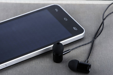 Headphones and phone