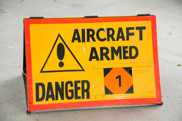 Naklejka premium Aircraft Armed sign