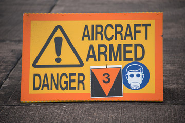 Fototapeta premium Aircraft Armed sign