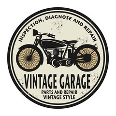 Grunge rubber stamp with the words Vintage Garage