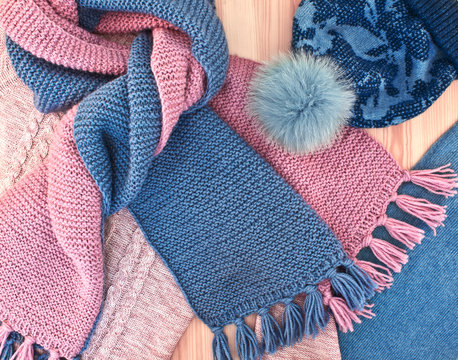 Warm knitted women's clothes and accessories