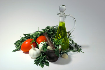 Tomatoes, garlic, olive oil and  herbs for sauce preparation