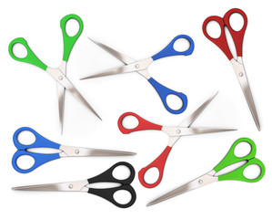 A set of open and closed colorful scissors on a white background