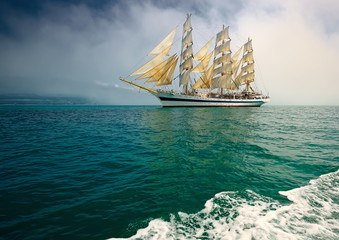Fototapeta na wymiar Beautiful sailing ship in the fog