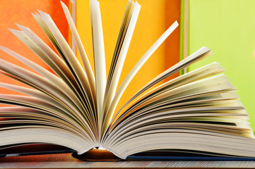 Composition with hardcover books in the library
