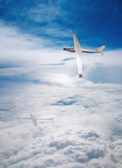 Fototapeta na wymiar Flight deltaplane clouds