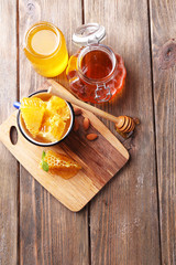 Fresh honey on wooden table