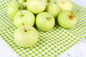 Ripe apples on napkin close-up