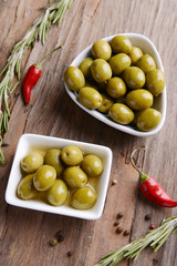 Marinated olives on table close-up