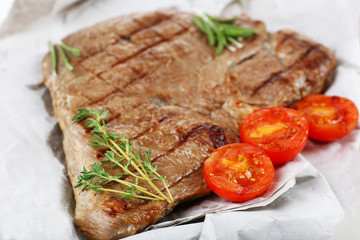 Delicious grilled meat on table