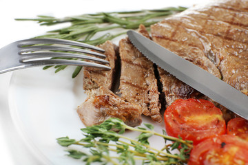 Delicious grilled meat on table, close-up