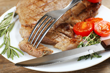 Delicious grilled meat on table, close-up
