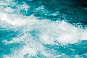 Obraz na płótnie Canvas abstract background. water wave with splashes