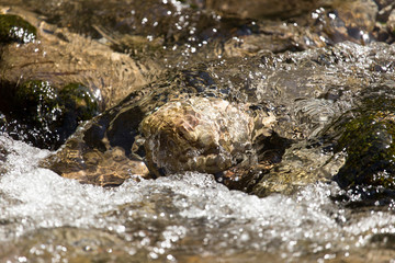 Stones in the water in a river